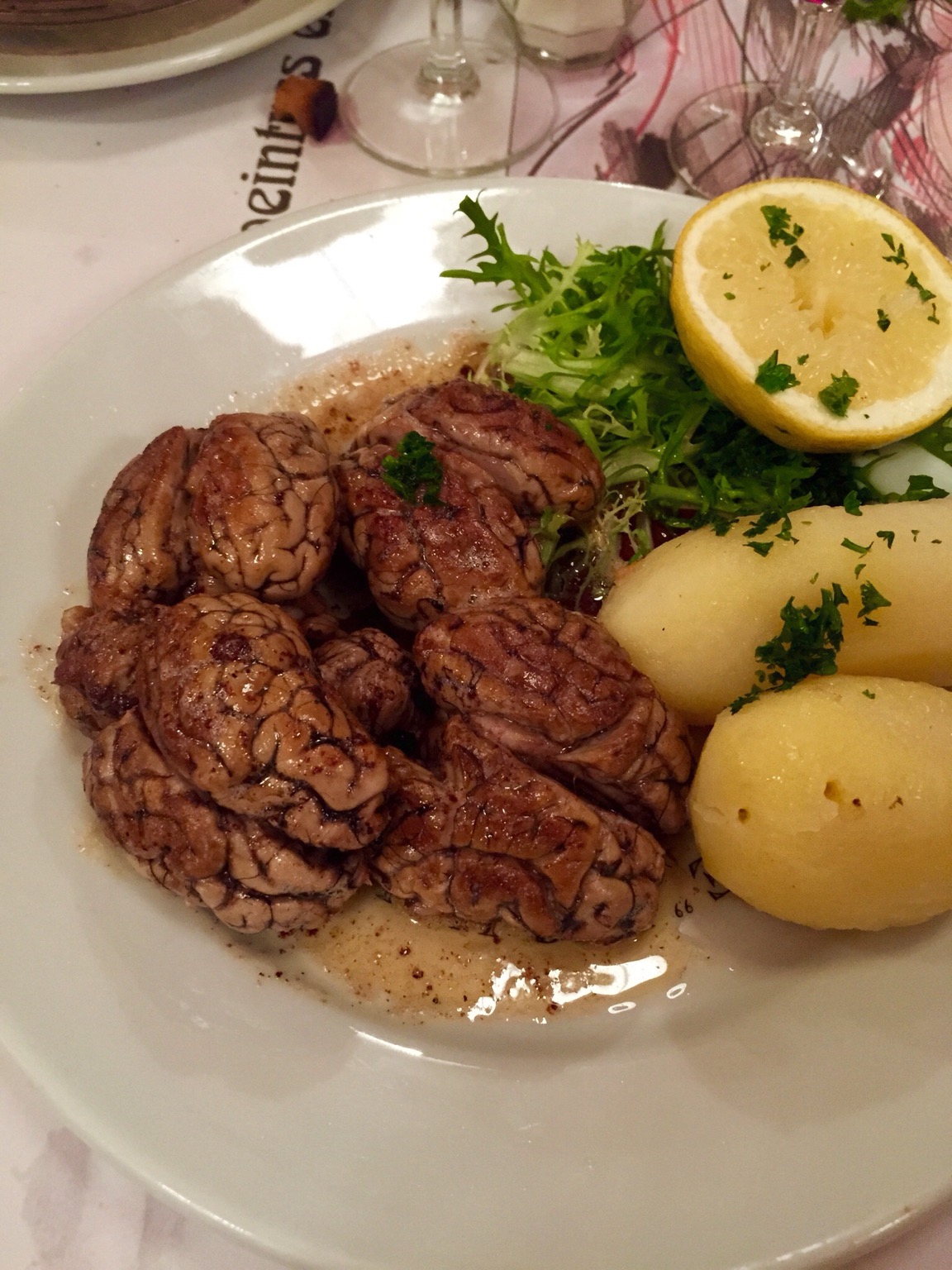  lamb brains meunière served in a paris bistrot 